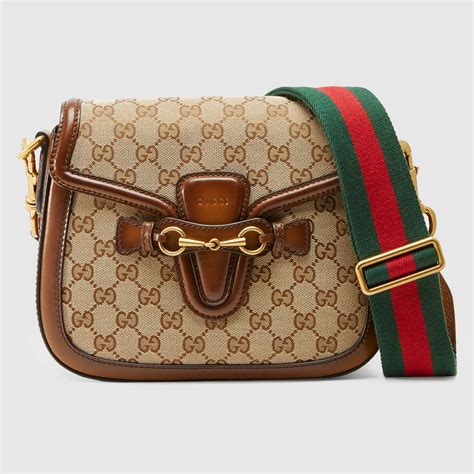 gucci canvas shoulder bag.